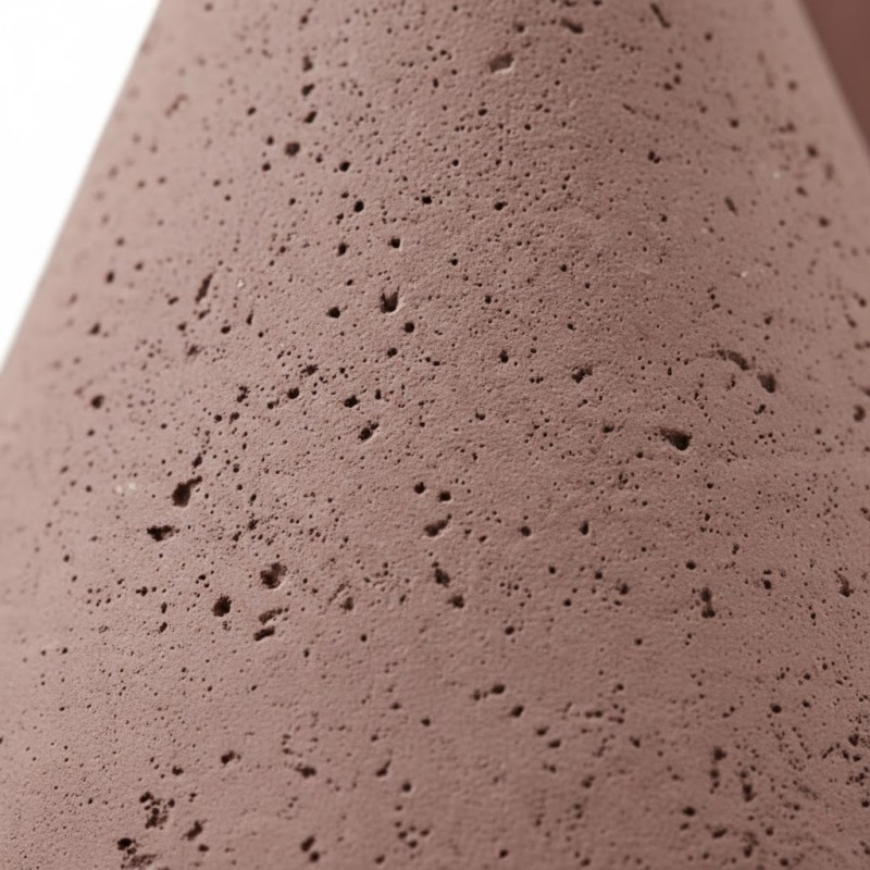 Close-up van poriën in baksteenrood beton