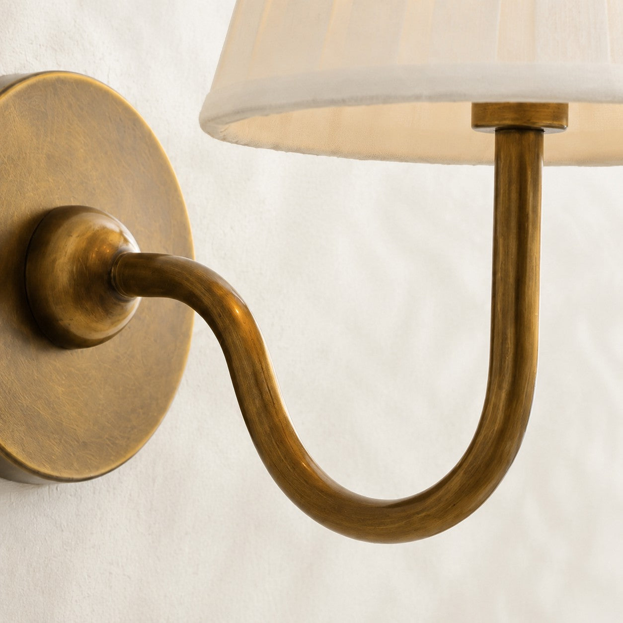 Curva de latón elegante