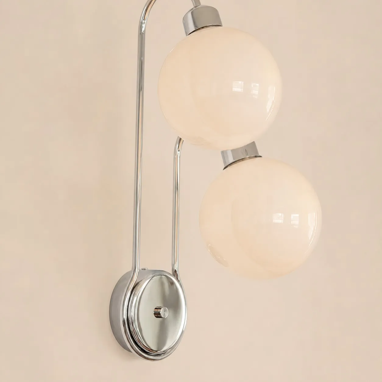 Close view of polished metal wall backplate