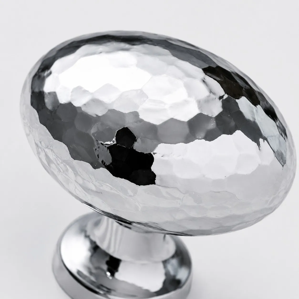 Close view of cabinet knob finish and mounting stem